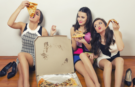 Начинът, по който хапваме пица, разкрива характера ни